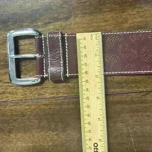 Women’s brown leather belt, size M/L 36” long 2” wide